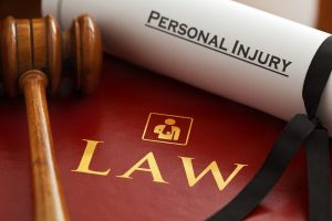 judge's gavel on a personal injury law book