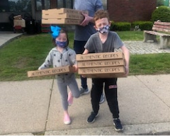 My family recently delivered a large shipment of pizzas and deserts to Father Bill’s Homeless Shelter in Quincy and the kids had a blast doing it. 