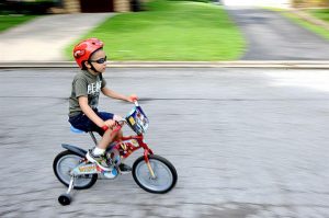 child on bicycle